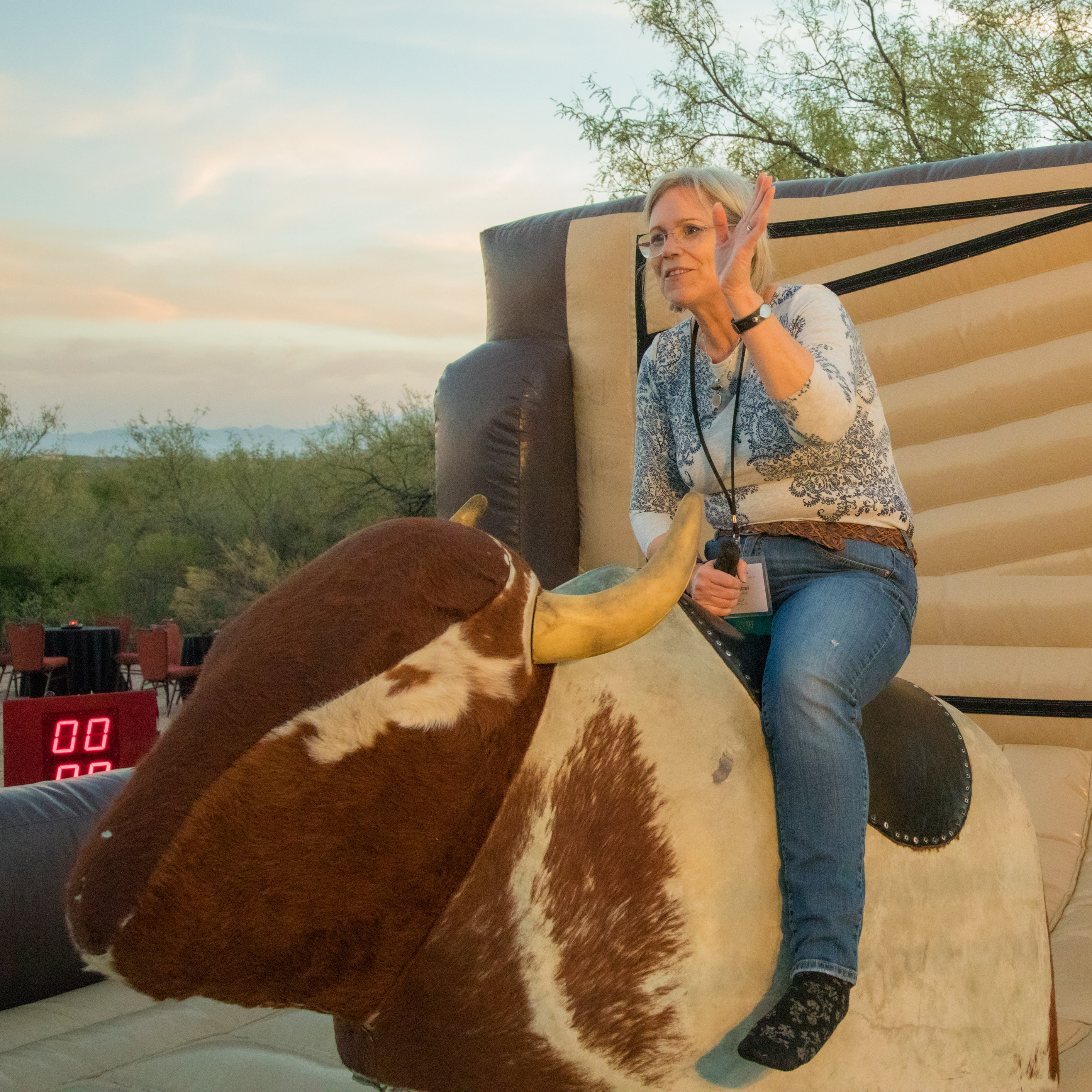 Marg Webb on bucking bronco - photo by Jeff Baker.jpg