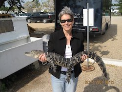 Marg Webb with an alligator
